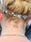 Britney spears back neck hebrew tattoo 
